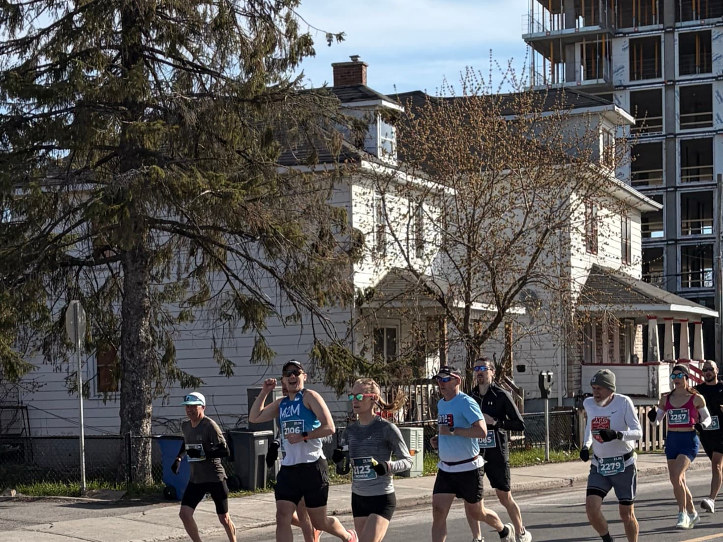 Connor running with other runners during the St. Lawrence Marathon.